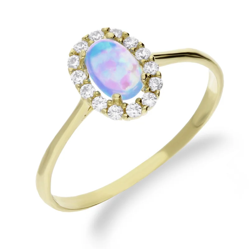 Pierścionek złoty markiza owalna z opalem niebieskim jubilerskim