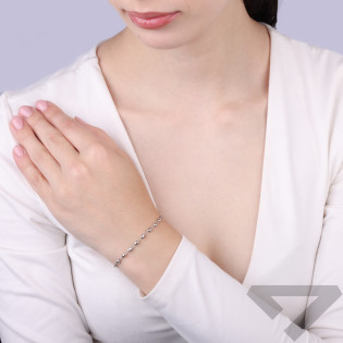 Bransoleta srebrna z dmuchanych, diamentowanych fasolek i gładkich elementów próba 925