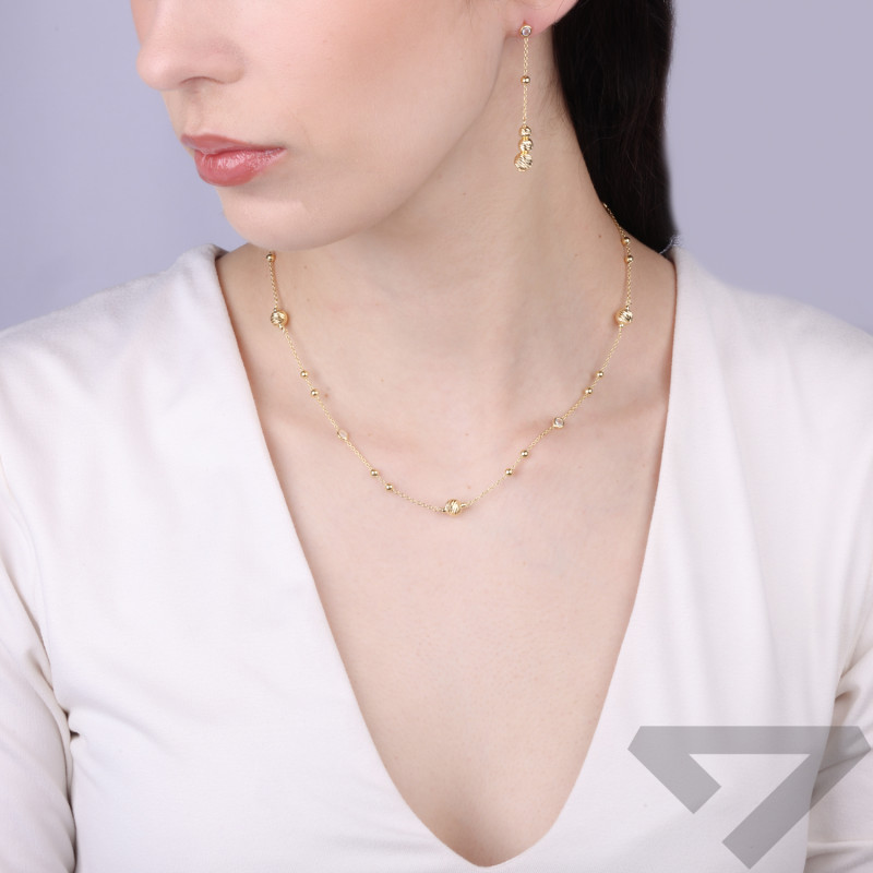 Kolczyki srebrne koloru złotego z diamentowanymi kulkami i cyrkonią, próba 925