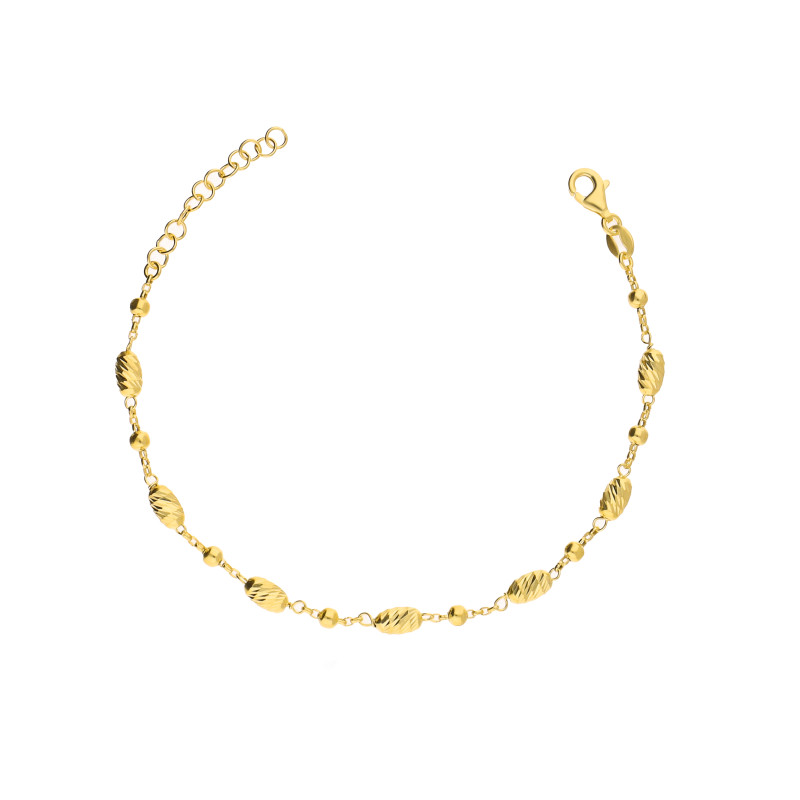 Bransoleta srebrna koloru złotego z ogniw w kształcie dmuchanych fasolek o diamentowanej powierzchni próba 925