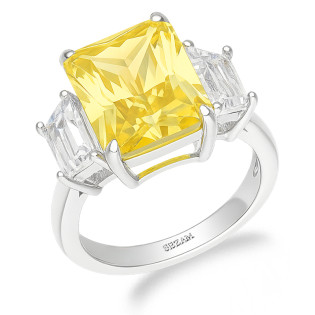 Pierścionek srebrny z dużą cyrkonią bagieta w kolorze żółtym