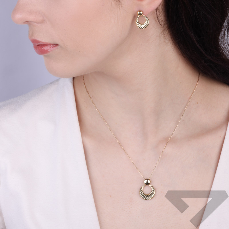 Komplet złotej biżuterii kolczyki i wisiorek ze złota diamentowanego 585