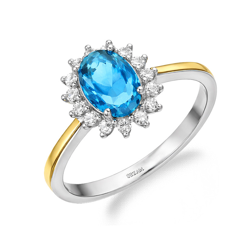 Pierścionek srebrny z niebieską cyrkonią i złotą blaszką próba 925