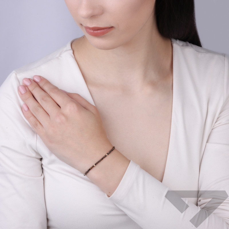 Bransoletka złota próba 585 z fasetowanymi bronzytami
