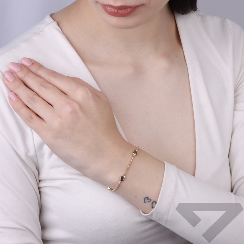 Bransoletka złota z kulkami fasetowanymi i gładkimi sercami, złoto próby 375