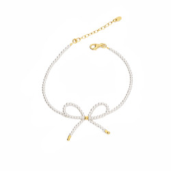 Bransoletka z perłami i kokardą, elementy koloru złotego ze srebra 925