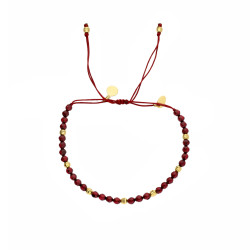 Bransoletka sznurkowa z fasetowanymi granatami i elementami ze srebra próby 925