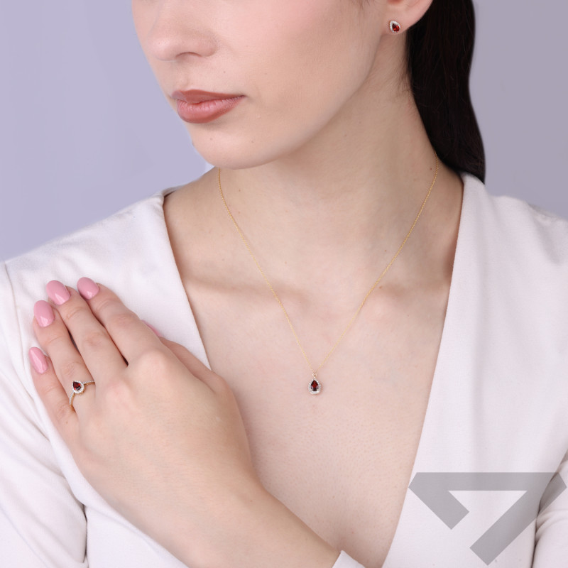 Pierścionek Markiza łezka z granatem 0,44 ct i diamentami 0,16 ct, złoto 585