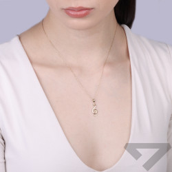 Wisiorek klucz wiolinowy z cyrkoniami, złoto 375