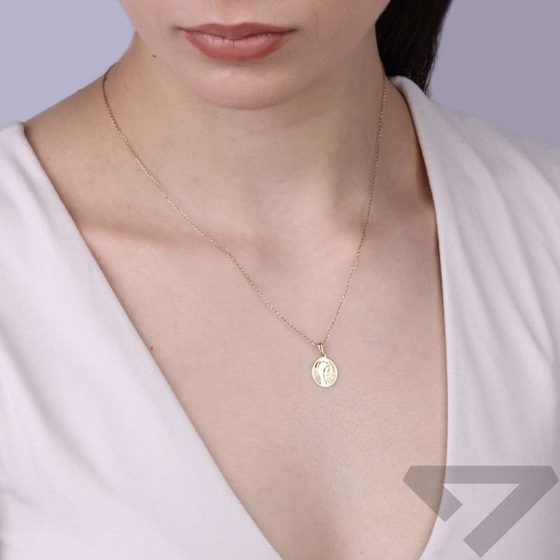 Medalik złoty z Matką Boską na diamentowanym tle, próba 585