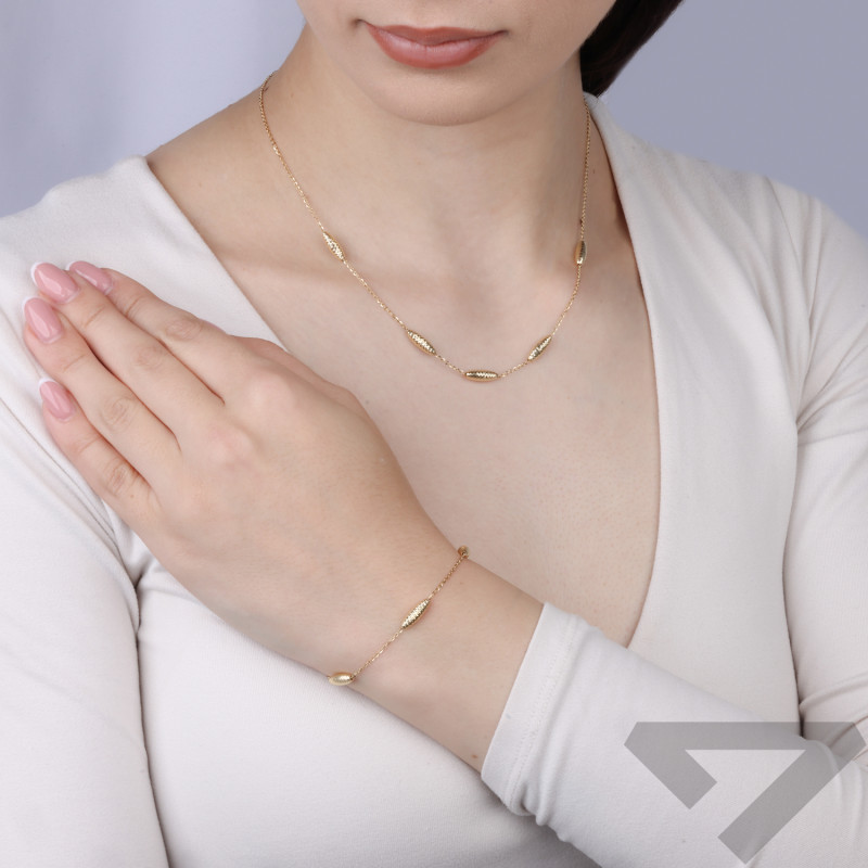 Naszyjnik złoty 14 karat z diamentowanymi fasolkami