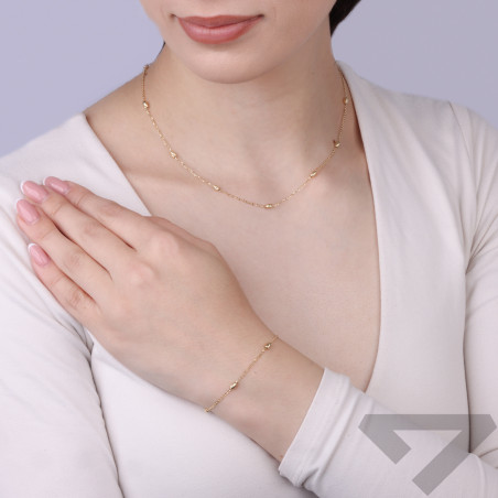 Naszyjnik złoty 14 karat łańcuszek rolo z diamentowanymi fasolkami