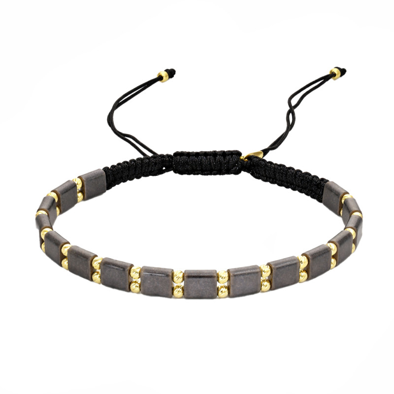 Bransoletka z hematytem grafitowym, kulki dis ze srebra 925 w kolorze złotym