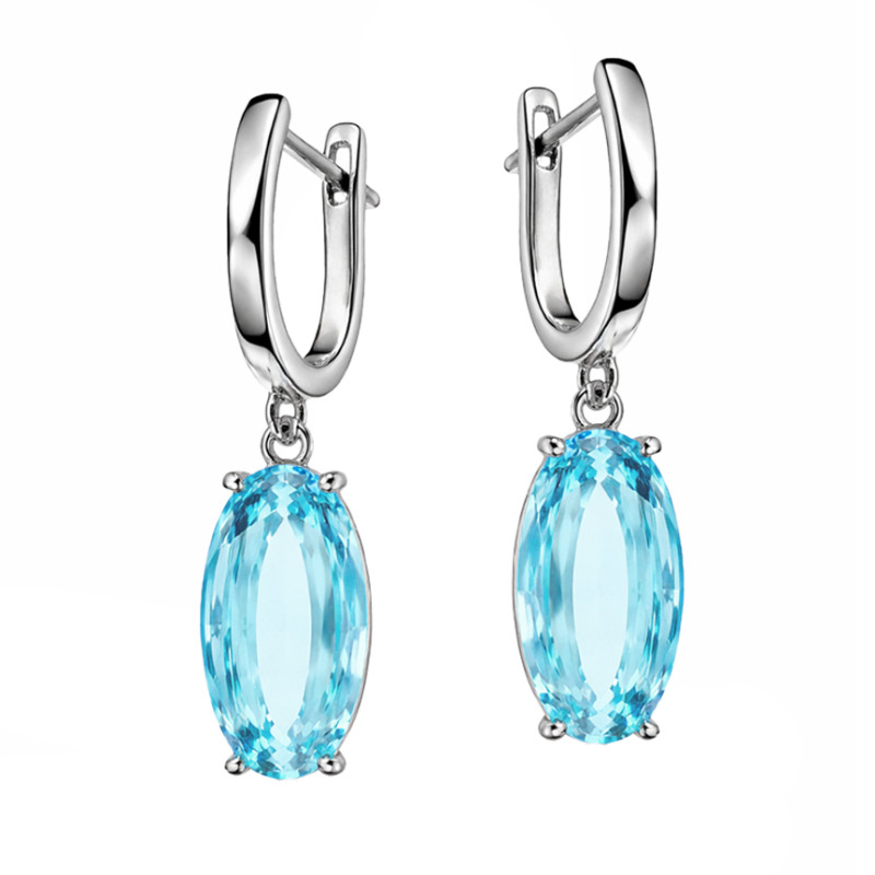 Komplet biżuterii kolczyki i wisiorek z topazem laboratoryjnym srebro 925