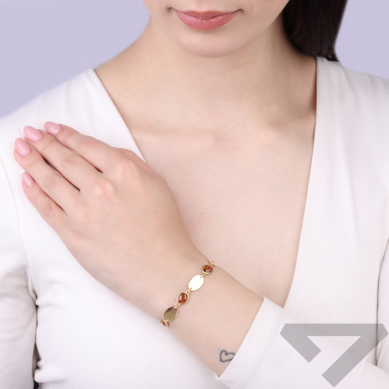 Bransoletka srebrna koloru złotego z brązowymi cyrkoniami fasetowanymi, próba 925